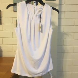 Dillard’s/Calvin Klein white sleeveless blouse